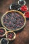 Homemade autumn sweet berry pie on dark rustic background