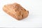 Homemade baked spelled bread on a wooden background.