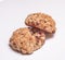 Homemade baking.Oatmeal cookies with raisins.Two cookies on a white background.