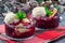 Homemade Berry Cobbler in glass ramekin with ice cream, Christmas decoration, horizontal