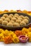 Homemade besan laddoo with flowers kept with rangoli