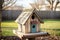 homemade birdhouse in an empty backyard