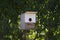 Homemade birdhouse in the garden