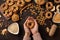 Homemade birdseed dumplings, winter food for birds, dark wooden background, top view