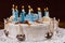 Homemade birthday cake with lots of blue burning candles