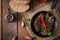 Homemade blood sausage with offal on the old wooden background in rustic style.