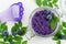 Homemade blueberry huckleberry sugar foot scrub/bath salts/foot soak in a glass jar. DIY cosmetics for natural skin care.
