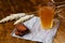 Homemade bread kvass with black rye bread and hard chucks on a wooden table.