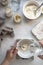 Homemade breadmaking with sourdough using wild yeast, busy lifestyle scene of baking at home, top view. Sustainable living