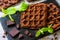 Homemade brownie waffles. Chocolate Belgian waffles with chocolate topping