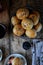 Homemade buns with linseed sunflower seeds for breakfast with butter and blueberry jam