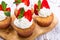 Homemade buttercream cupcakes with strawberries