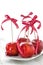 Homemade candied apples with a red bow