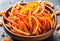 Homemade candied orange peel in a bowl