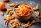 Homemade candied orange peel in a bowl