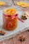 Homemade candied peels orange jam in glass jar