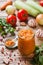 Homemade caviar from zucchini tomatoes and onions in a glass jar on a wooden background. Homemade production canning, canned