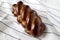 Homemade challah jewish bread on cloth, close-up. Jewish pastries