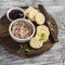 Homemade chicken liver pate, cranberry sauce and homemade cheese biscuits. Delicious snack or appetizer with wine. On light wooden