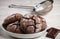 Homemade chocolate cookies with cracks. Biscuits with icing sugar