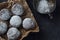 Homemade chocolate crinkles in powdered sugar, chocolate cookies with cracks and a glass of milk