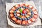 Homemade chocolate natural fruit pizza with berries