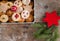 Homemade Christmas cookies: Delicious cookies and Christmas bauble are stored in a metal box, rustic wooden background