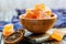 Homemade citrus marmalade in a wooden bowl.