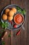 Homemade classic Arancini Di Riso, crispy Sicilian rice balls stuffed with Mozzarella cheese, served with hot Arrabbiata dipping s