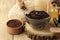 Homemade coffee scrub in the face and body bowl and various ingredients for making scrub on a wooden table. spa. cosmetics. care c