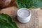 Homemade comfrey root ointment with fresh Symphytum officinale l