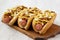 Homemade Coney Island hot dog on a rustic wooden board on a white wooden surface, side view. Close-up