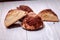 Homemade Cookies with chocolate truffle on white wood with defocused background.