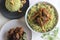 Homemade Coriander pulao, a one pot rice preparation in ghee with onions, green chutney and whole spices. Served with mutton roast