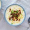 Homemade Corn Chowder with Bacon in Bowls, top view. Flat lay, overhead, from above
