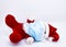 Homemade cotton Santa Claus lying or fallen play with a mask to protect against Covid-19 or Coronavirus