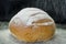 Homemade country bread with flour rain