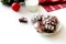 Homemade Cracked chocolate marble cookies for Christmas and cup tea with milk on table. Traditional American chocolate cookies for