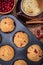 Homemade cranberry muffins and cup of coffe.