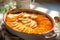 Homemade creamy scalloped potatoes baked in a baking dish with butter and cream. Generative AI