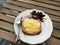 Homemade Creamy Scrambled Eggs in Breakfast Plate with Toast Bread, Cheese and Blackberry Jam