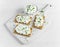 Homemade Crispbread toast with Cottage Cheese and parsley on white wooden board.