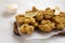 Homemade crispy japanese fried chicken Karaage on a rustic wooden board, side view. Closeup