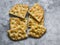 Homemade crunchy italian focaccia on a grey background, top view. Traditional italian bread