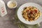 Homemade curly pasta with mushrooms and parmesan cheese