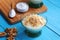 Homemade custard with walnut, Turkish muhallebi on wooden background