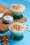 Homemade custard with walnut, Turkish muhallebi on wooden background