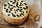 Homemade delicious prunes pie. fruit cake baked,wooden background