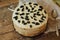 Homemade delicious prunes pie. fruit cake baked,wooden background