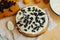 Homemade delicious prunes pie. fruit cake baked,wooden background